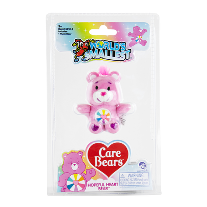 A pink Hopeful Heart Mini Care Bear in the Package.