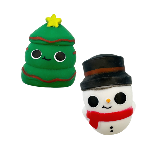 Two holiday or Christmas themed stretchy squish fidget toys. One is a Christmas tree, and the other is a snowman. 