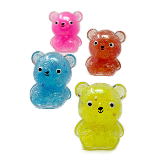 Four colorful squish sticky glitter toy bears.