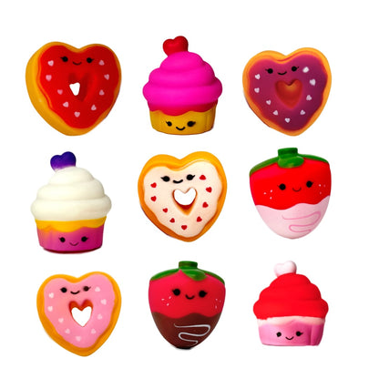 A collection of Valentine's Day cute bath toys including Valentine's Day toy heart shaped cookies, cupcakes, and chocolate dipped strawberries.