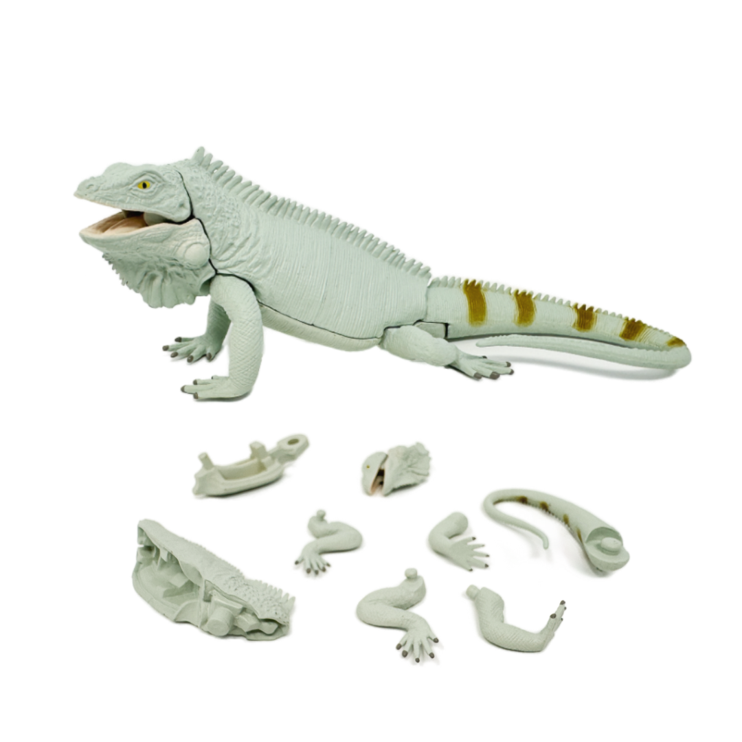 A playable toy lizard puzzle. It comes in 8 pieces and is building toy.