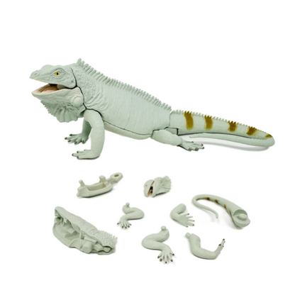 A playable toy lizard puzzle. It comes in 8 pieces and is building toy.