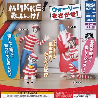 4 small collectible figurines of Where's Waldo characters including Wenda, woof, and the Wizard on a flyer with Japanese writing. 