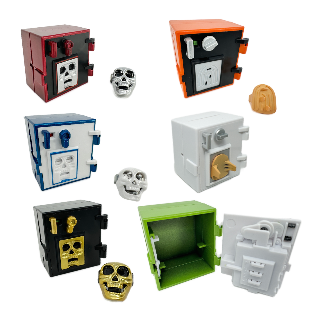 6 colors of miniature safes that actually unlock on with a skull key or fingerprint shaped key.