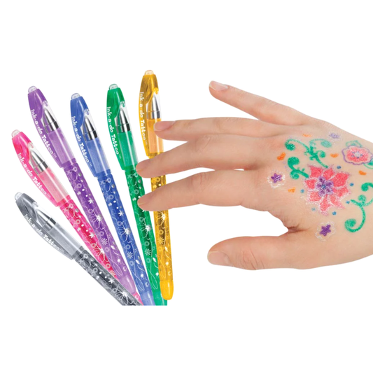 A hand with colorful temporary tattoo designs and the pens that made them.