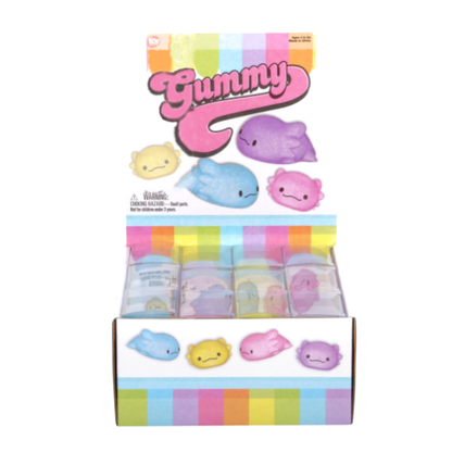 The display box showing the mochi axolotl gummies come in a little plastic box.