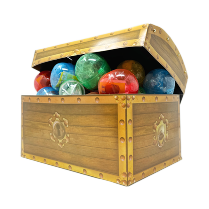 A cardboard treasure chest full of capsule toys.