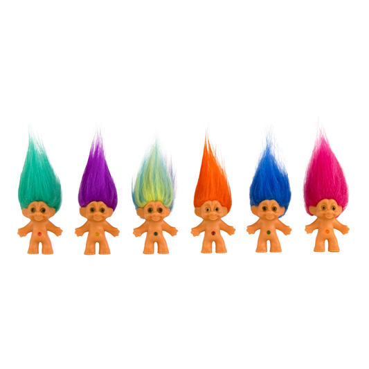 Six tiny troll dolls with gems in their bellies. Each has a different color hair.