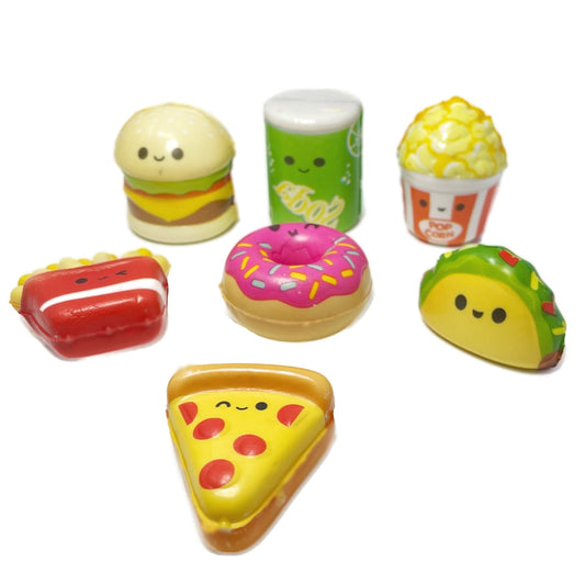 Seven micro squishy foods fidget toys. Designs include taco, pizza, burger, donut, soda, fries, and popcorn