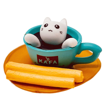 A toy figurine of a white toy cat with a teal toy coffee cup.